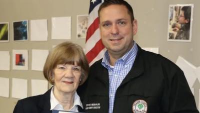 Carole McDermott (left) and Orange County Executive Steven M. Neuhaus